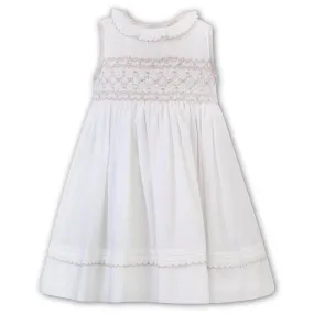 Sarah Louise - Ivory hand smocked dress with taupe detail